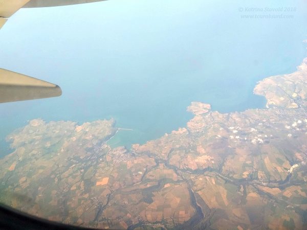 The coast of Ynys Dinas, Newport, UK, as seen from a plane.